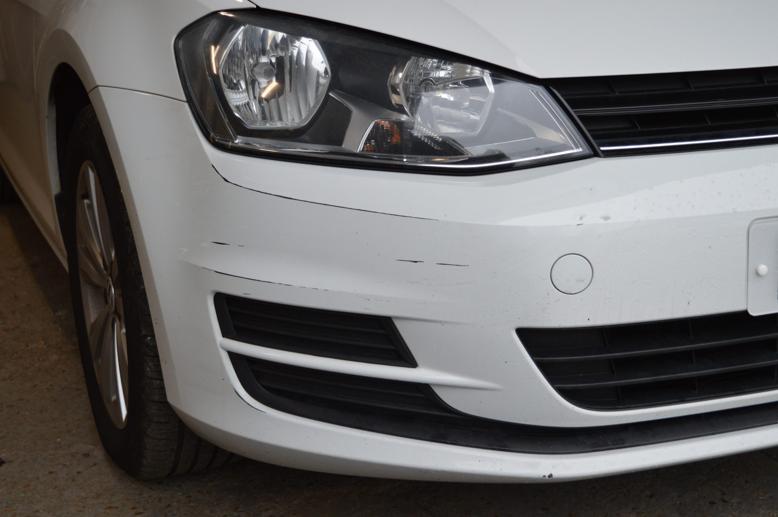 Cosmetic paint repair to a car panel